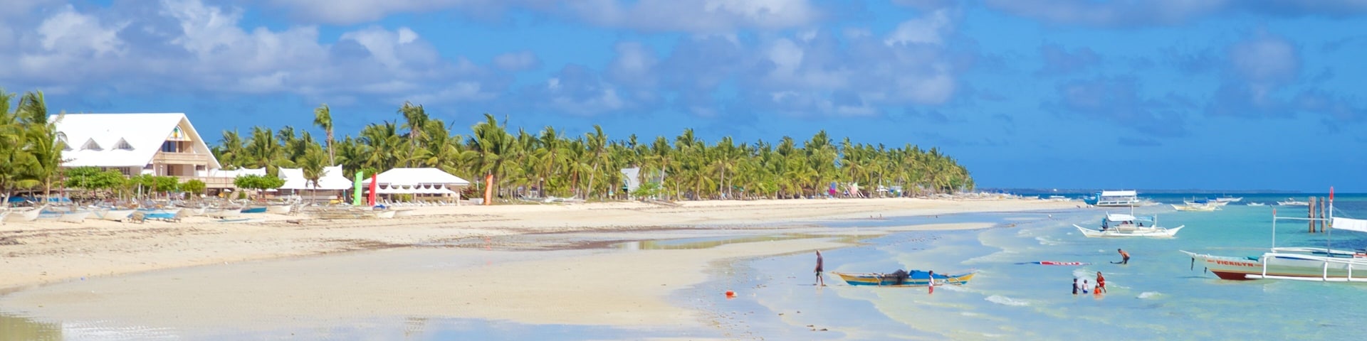 Terminal de Balsa de Santa FĂ© mostrando uma praia e paisagens litorĂąneas