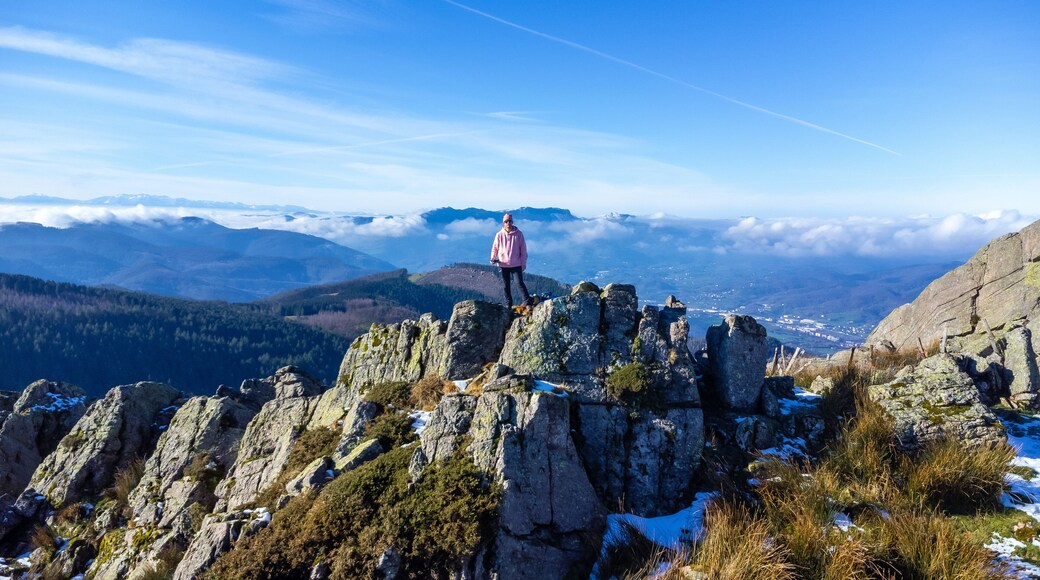 A man at the top of Mount Adarra, municipality of Urnieta in Gipuzkoa. Basque Country