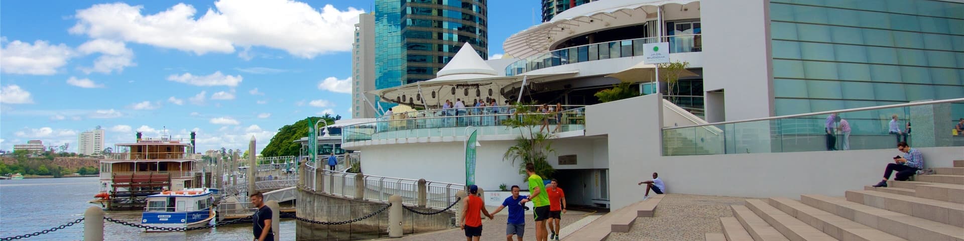 Eagle Street Pier showing a skyscraper, a city and a river or creek
