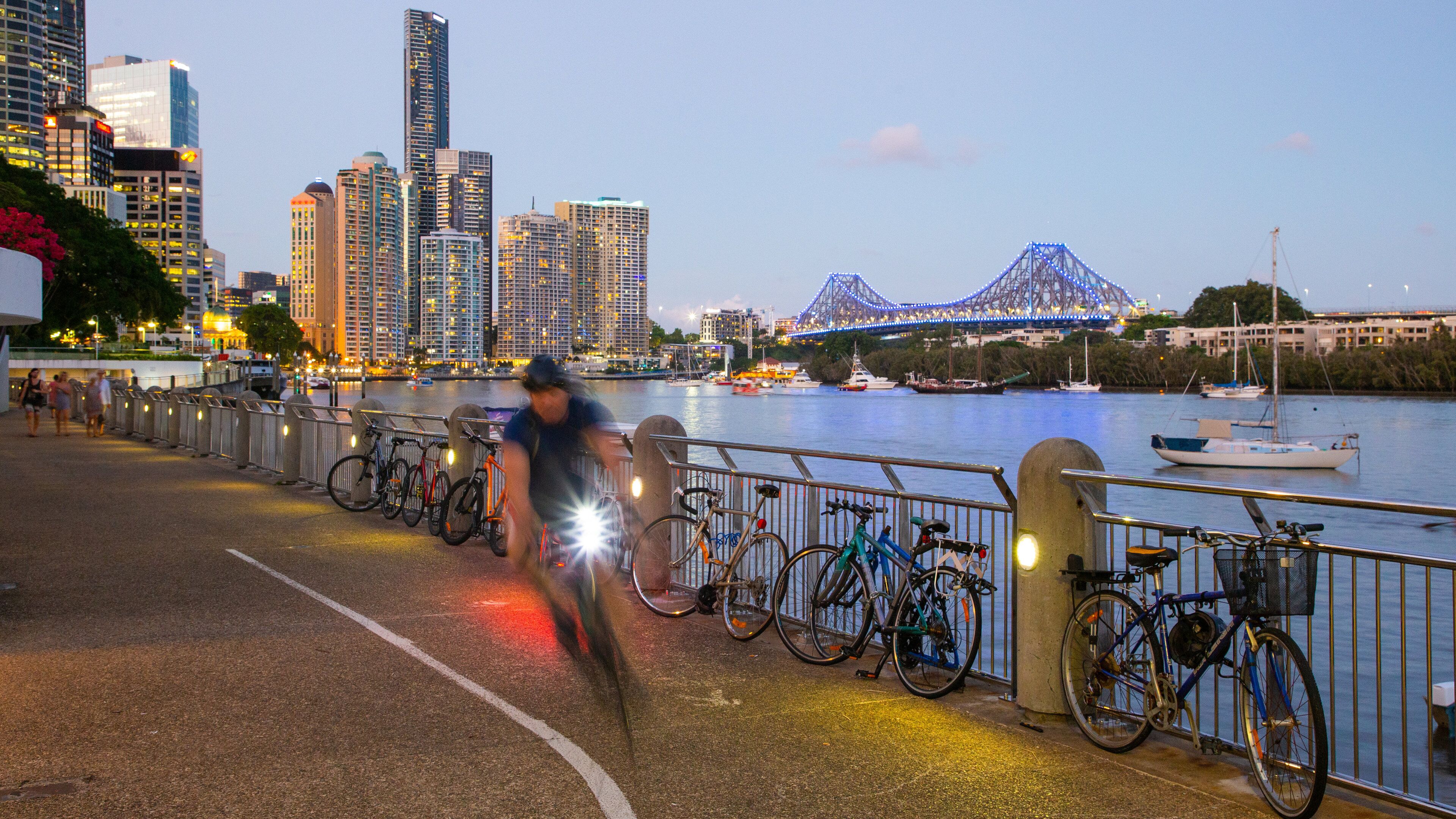 Eagle Street Pier featuring a city, a river or creek and cycling