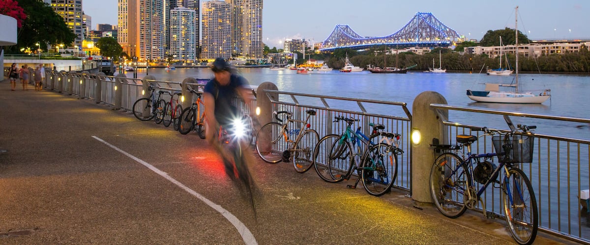 Eagle Street Pier featuring a city, a river or creek and cycling