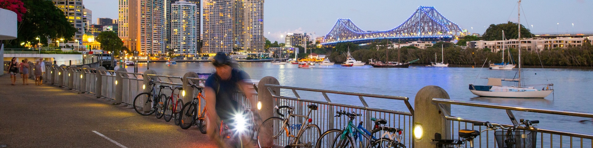 Eagle Street Pier featuring a city, a river or creek and cycling