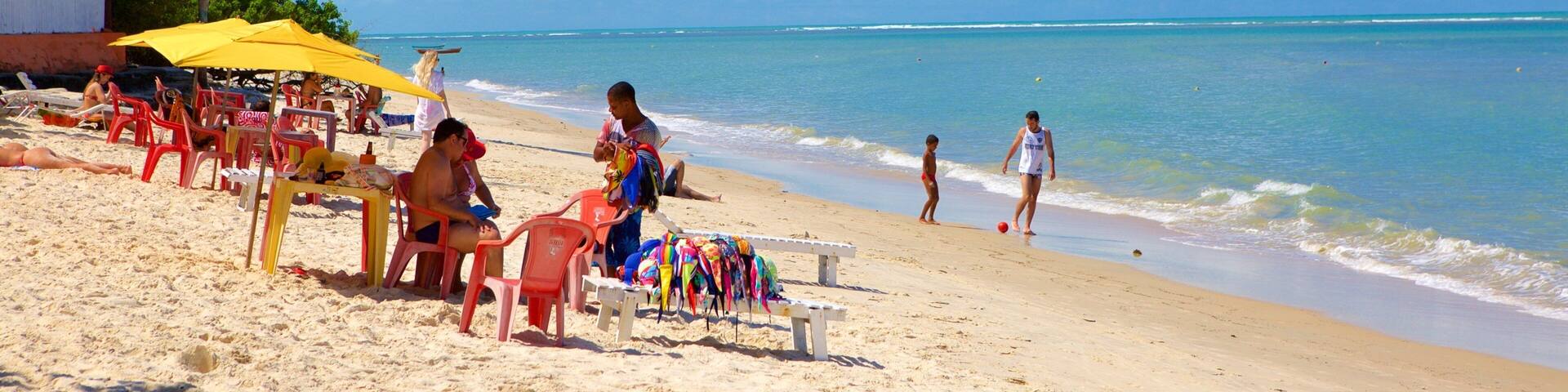 Muta Beach which includes general coastal views, a beach and tropical scenes