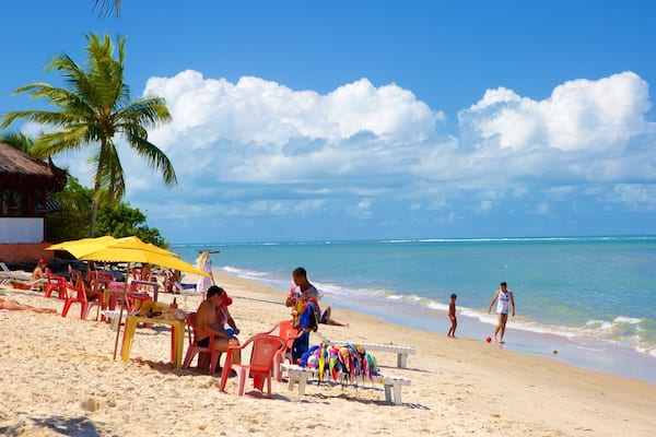Muta Beach which includes general coastal views, a beach and tropical scenes