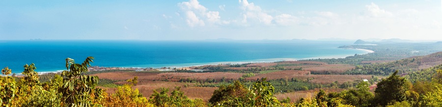 Viewpoint on Chumphon coastline from Buddha gold statue at Wat Khao Chedi-Phra Yai temple located on top of hill, Pathio, Chumphon district, Thailand
