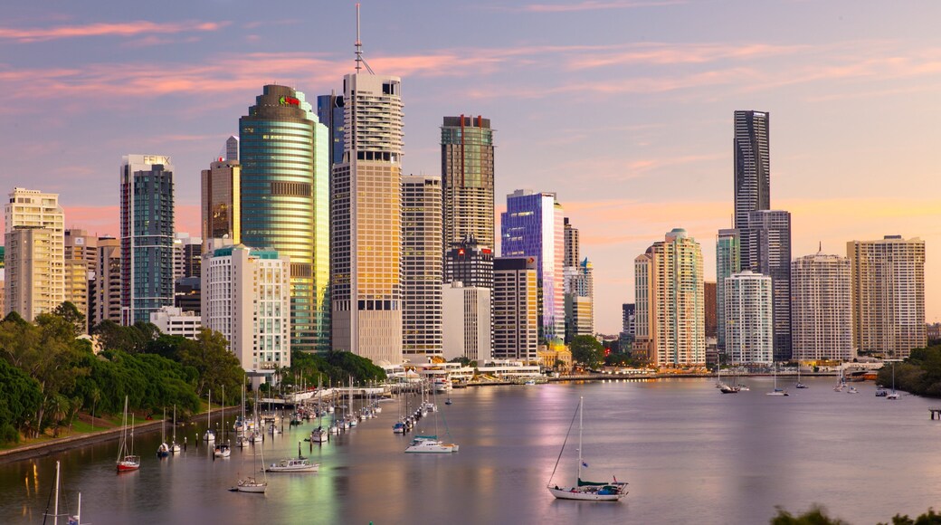 Kangaroo Point Cliffs which includes a city, a sunset and a river or creek