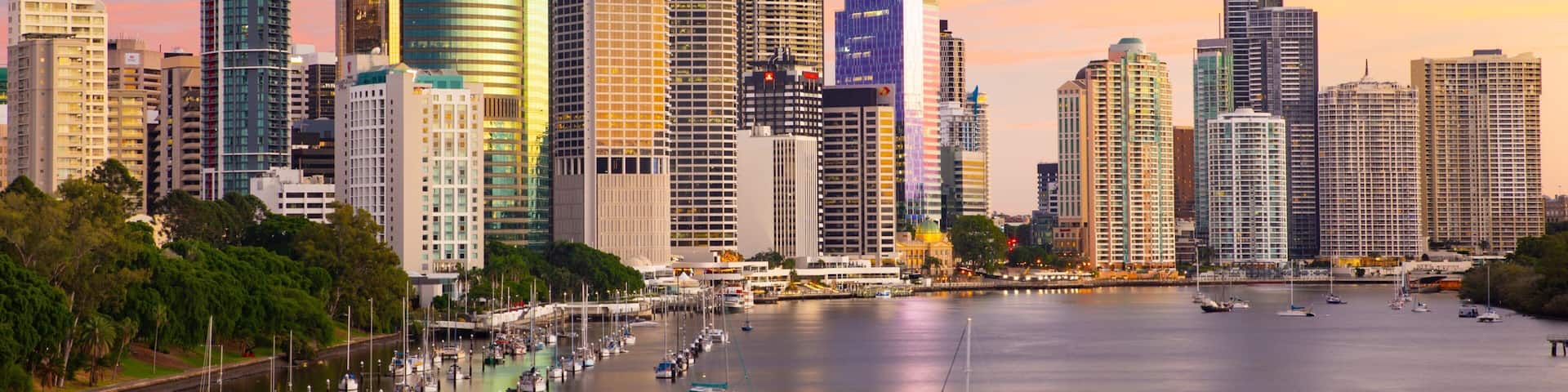 Kangaroo Point Cliffs which includes a city, a sunset and a river or creek