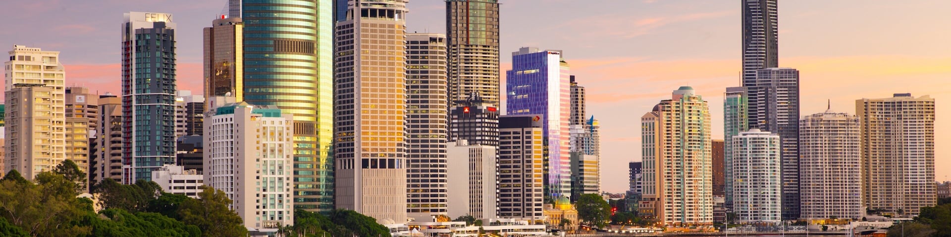 Kangaroo Point Cliffs which includes a city, a sunset and a river or creek