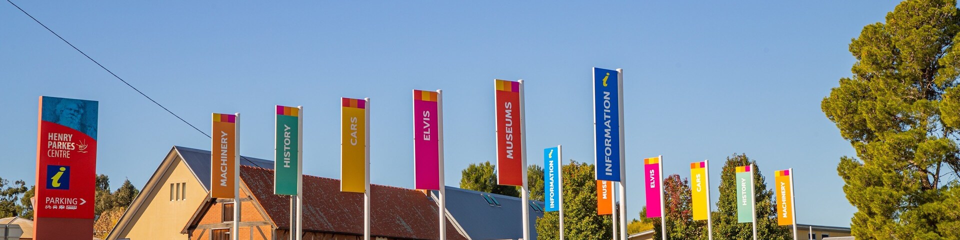 Henry Parkes Centre featuring a garden and signage