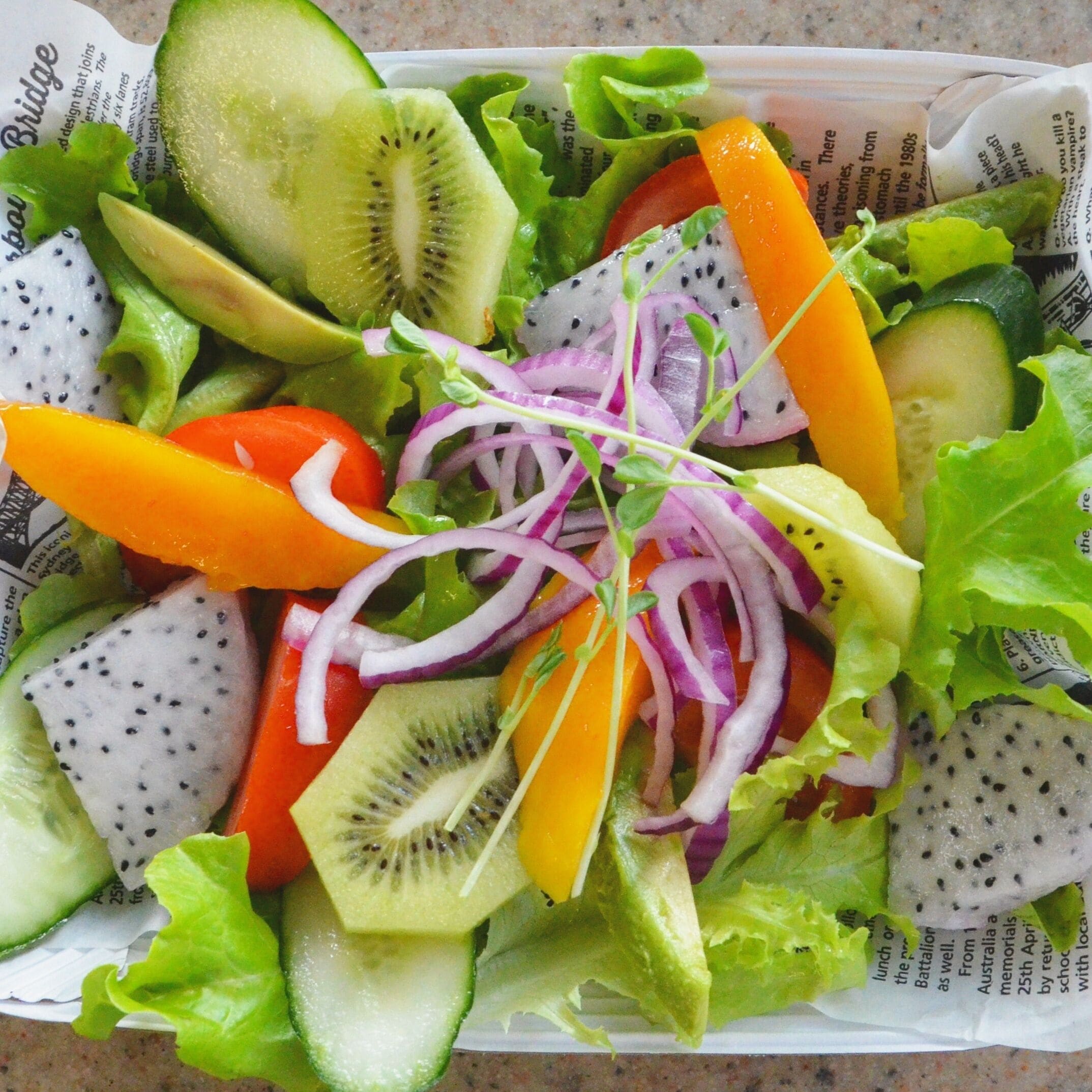 The most delicious salad I've had in quite a while. Made up of the usual salad suspects - lettuce, tomato, onion with a few surprising extras - kiwi fruit, papaya and dragonfruit!

#FoodieFinds