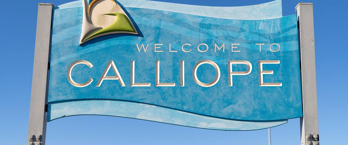 A blue welcome sign with the text "WELCOME TO CALLIOPE" and a stylized 'G' logo.
