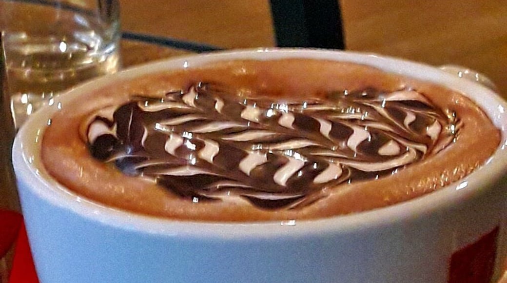 It is a beautiful café bar by the sea, waiting to serve you delicious coffee and drinks in a greatly decorated spacious environment. Great lounge music, fantastic service and best treat of all the impeccable view of the sea!