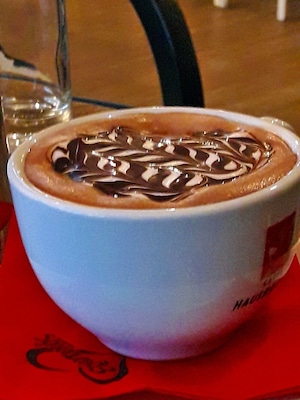 It is a beautiful café bar by the sea, waiting to serve you delicious coffee and drinks in a greatly decorated spacious environment. Great lounge music, fantastic service and best treat of all the impeccable view of the sea!