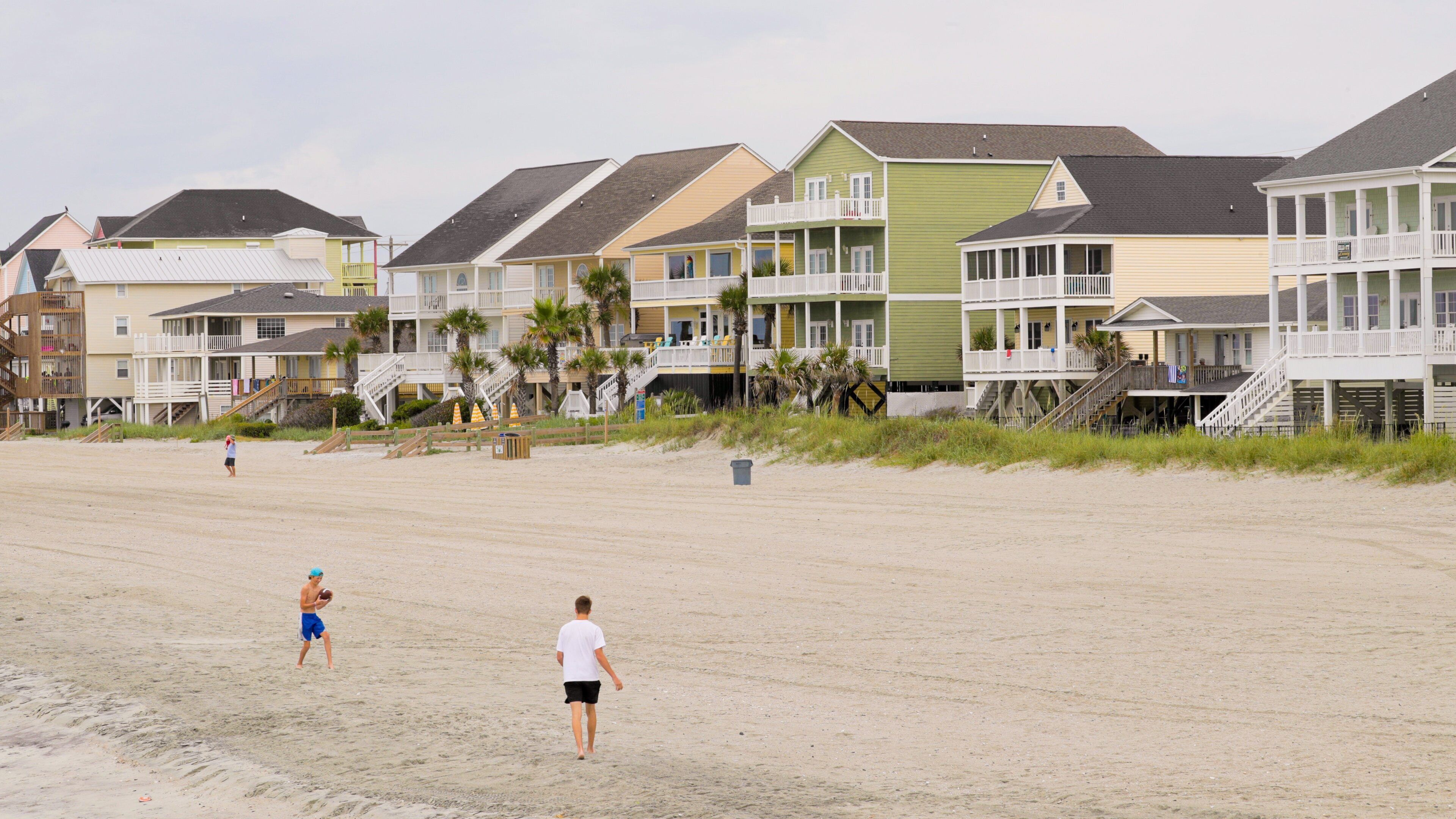 Cherry Grove Pier showing general coastal views, a beach and a coastal town
