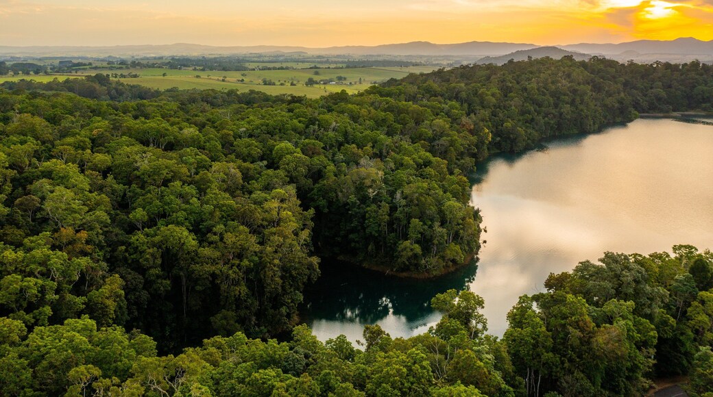 Lake Eacham featuring tranquil scenes, landscape views and a sunset