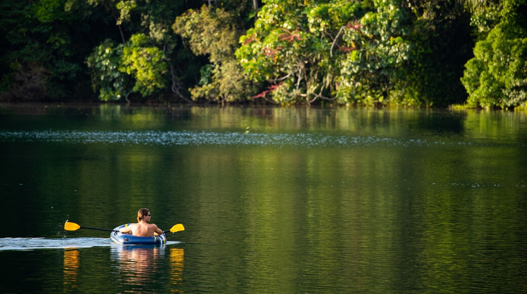 Lake Eacham which includes a lake or waterhole and kayaking or canoeing