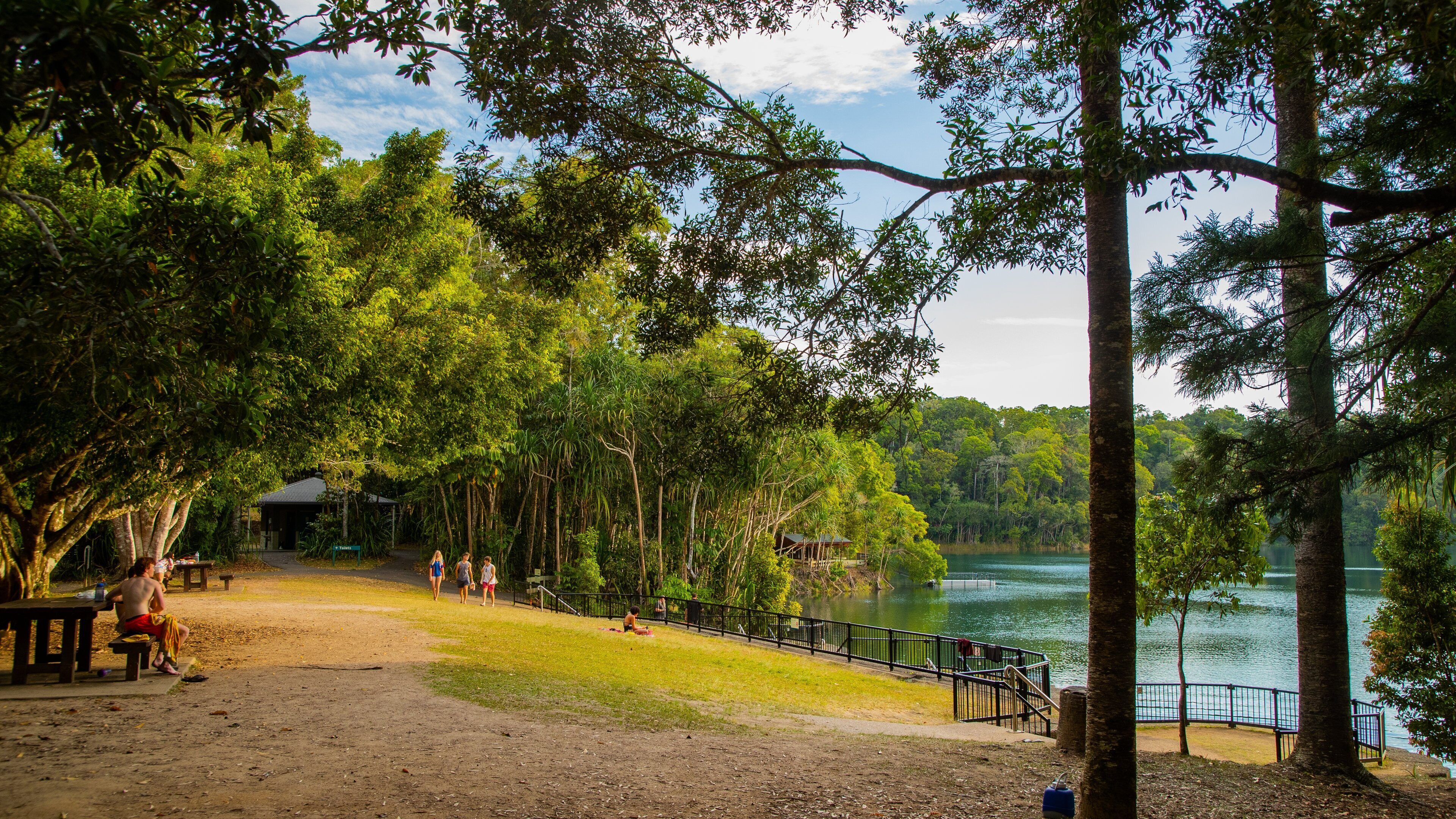 Lake Eacham featuring a lake or waterhole and a park