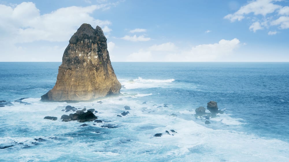 Beautiful Papuma Beach with a big rock