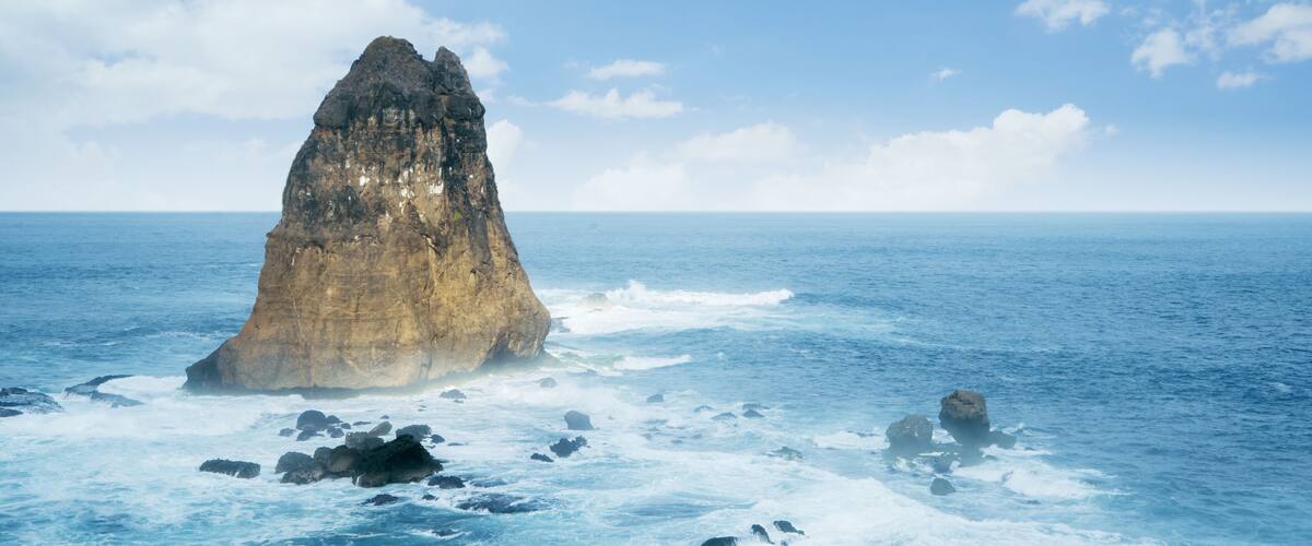 Beautiful Papuma Beach with a big rock