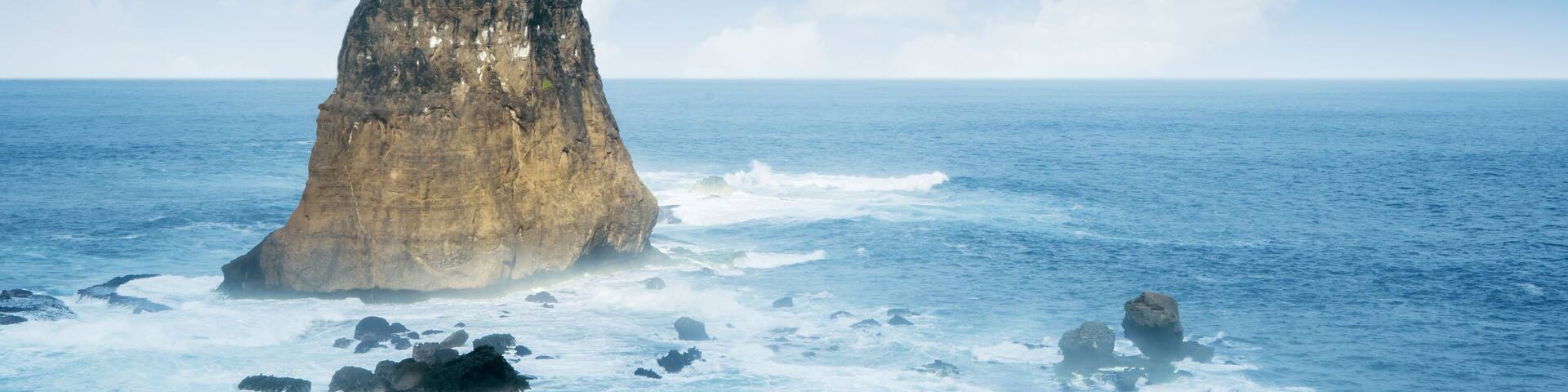 Beautiful Papuma Beach with a big rock