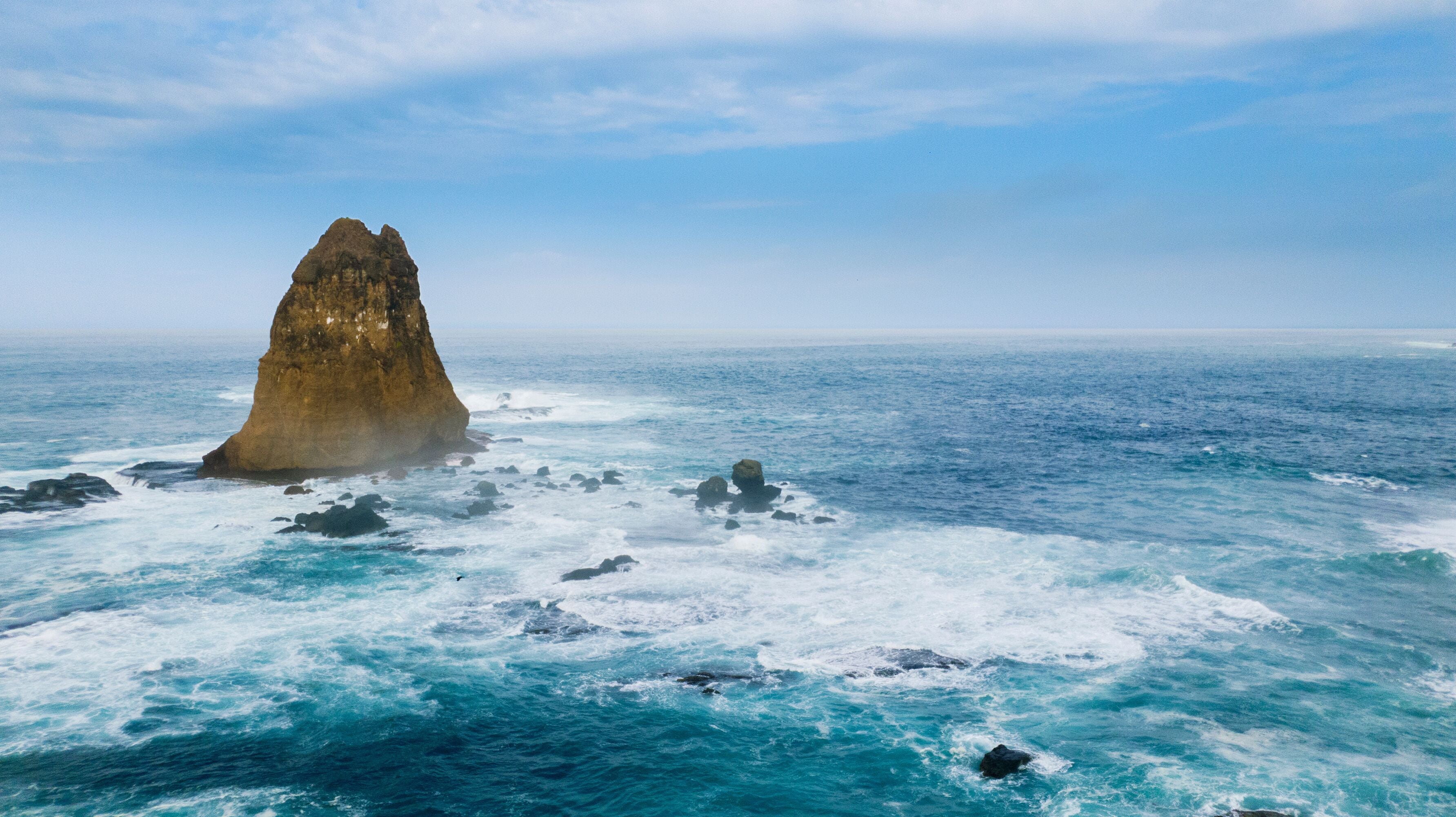 Beautiful seascape with big coral on Papuma beach