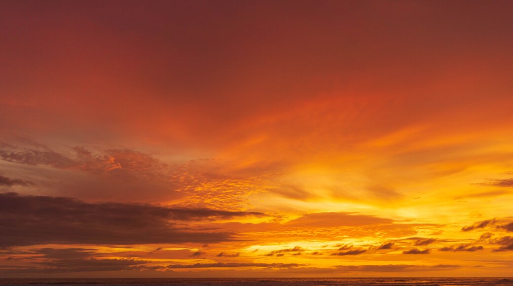 Seascape - sunset on the beach, waves, horizon. Top view. landscape. Parangtritis Beach, Yogyakarta