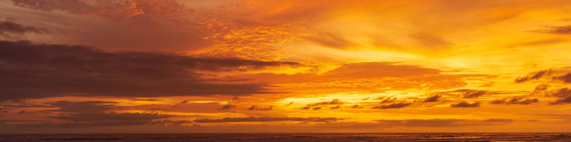 Seascape - sunset on the beach, waves, horizon. Top view. landscape. Parangtritis Beach, Yogyakarta
