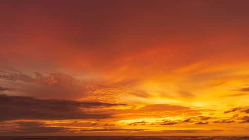 Seascape - sunset on the beach, waves, horizon. Top view. landscape. Parangtritis Beach, Yogyakarta