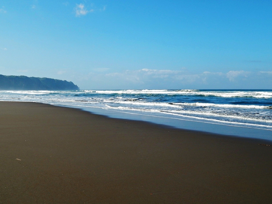 Deserted local beach outside of Jogja. Clean -- some rough waters. Food stalls and sandboarding close-by.
