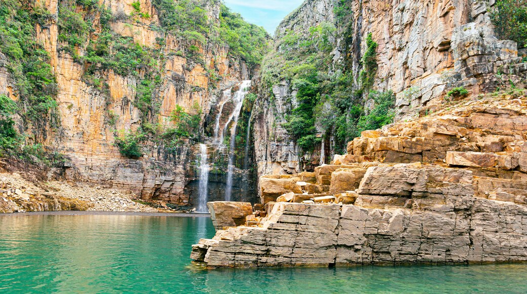 Landscape of Canyons of Furnas and the waterfall, Capitólio MG, Brazil. Green water of the lake between big sedimentary rocky walls. Mar de Minas, eco tourism destination of Minas Gerais state.