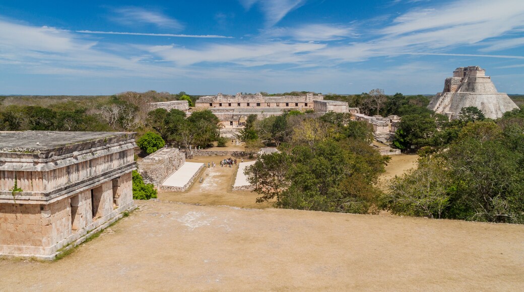 Nun's Quadrangle (Cuadrangulo de las Monjas) building complex and the Pyramid of the Magician (Piramide del adivino) at the ruins of the ancient Mayan city Uxmal, Mexico