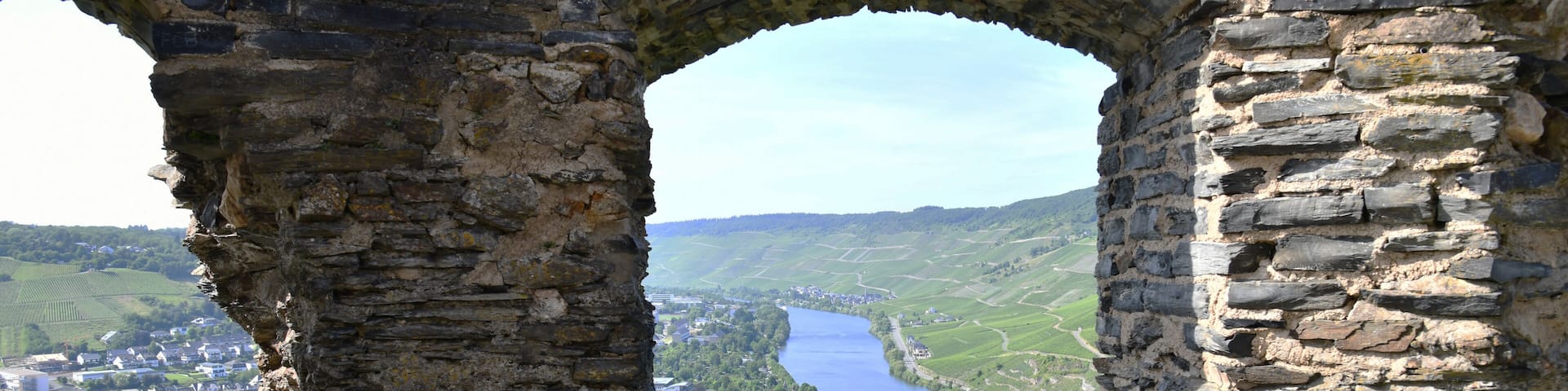 Bernkastel-Kues is a charming town located on the banks of the Moselle River in Germany. It is famous for its ruins of Landshut Castle overlooking the town.