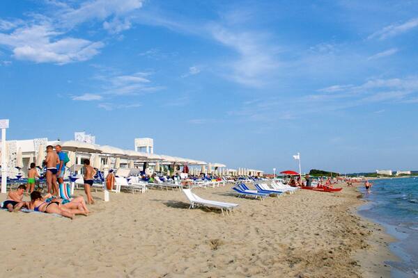 Baia Verde Beach which includes a sandy beach and general coastal views