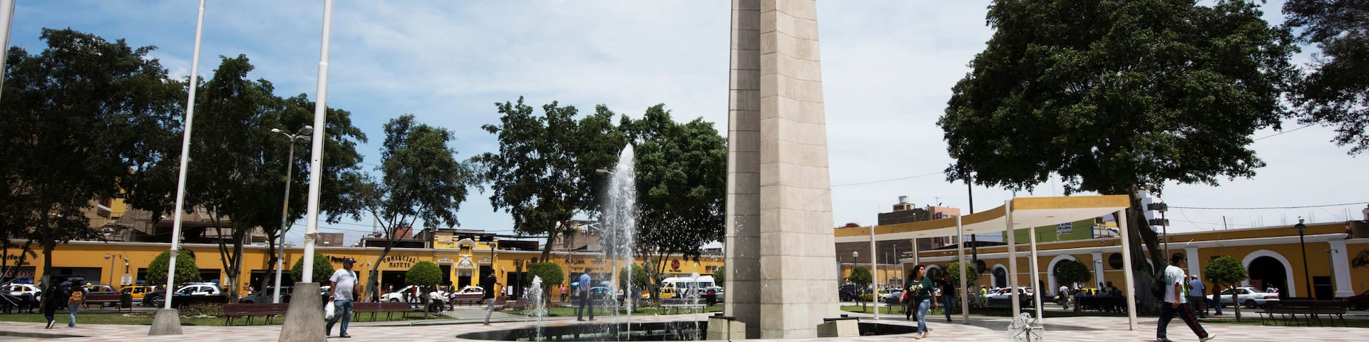 Peru Ica Plaza de Armas with its pyramid sculpture and its water fountain and garden with flowers