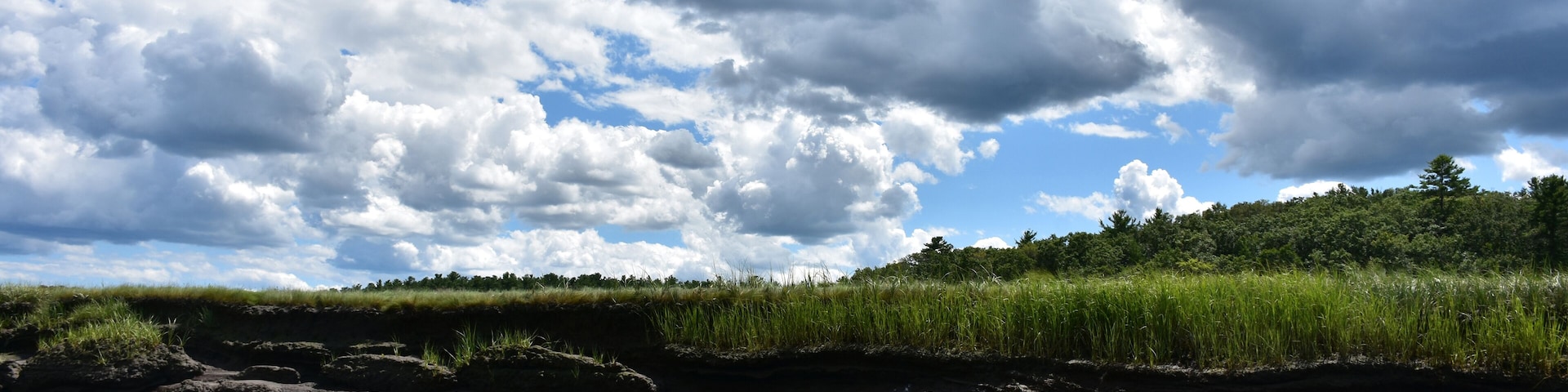 Beautiful Fluffy Clouds Over North River on South Shore
