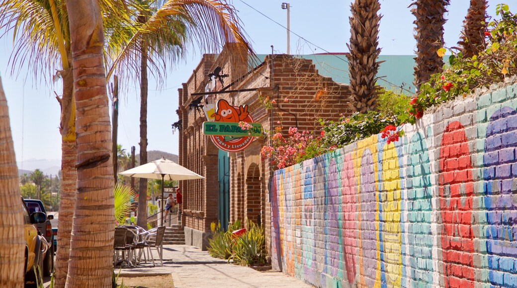 Prof. Nestor Agundez Martinez Cultural Center showing signage and outdoor art