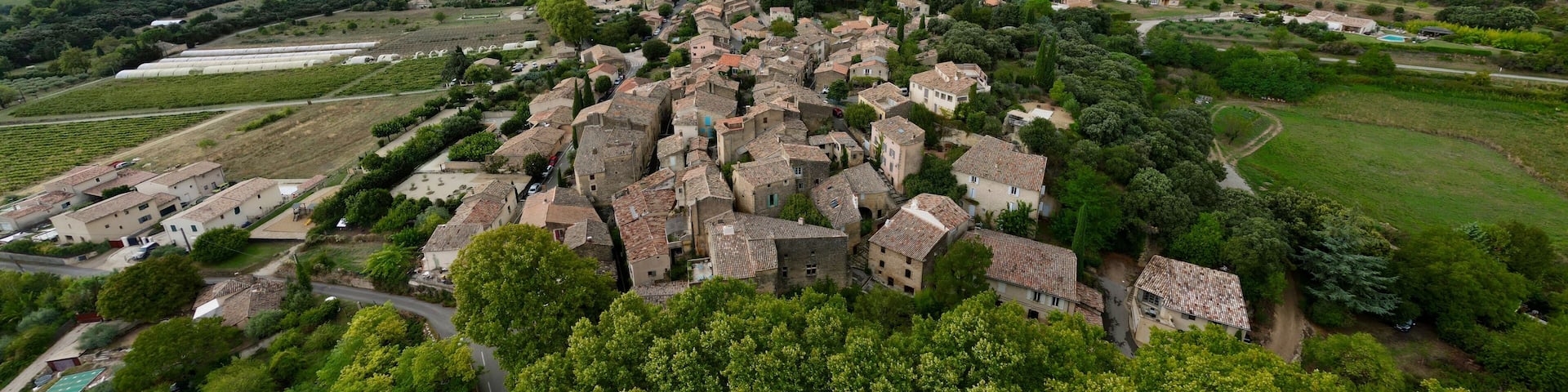 Aerial Journey Over Rustic Vaugines: A Charming Provencal Village in Vaucluse, PACA – Drone Exploration of Town