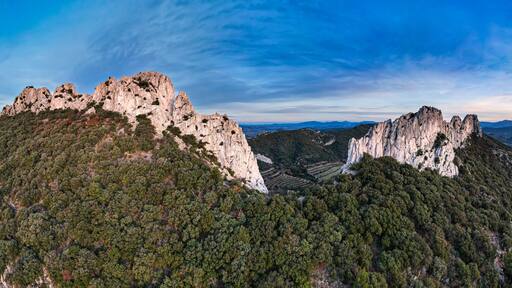 Aerial view of les Dentelles de Montmirail in front of the Mont Ventoux in the french alps