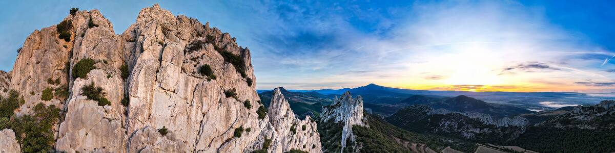 Aerial view of les Dentelles de Montmirail in front of the Mont Ventoux in the french alps