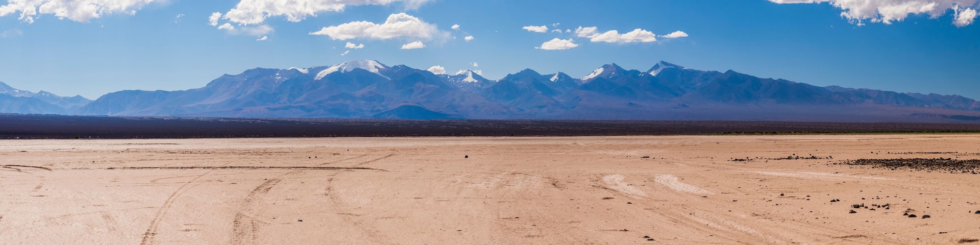 Dry river bed during a drought at El Barreal Blanco de la Pampa del Leoncito, San Juan Province, Argentina, South America, background with copy space