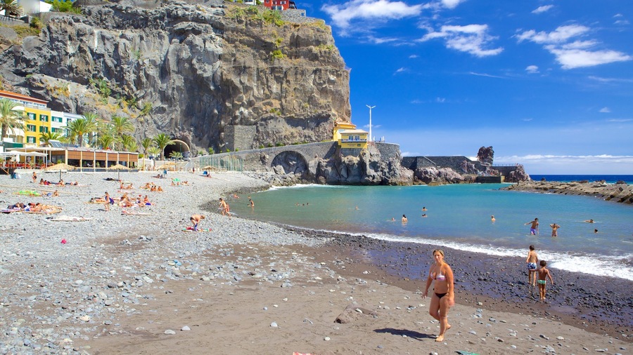 Ponta Do Sol Beach which includes swimming, a pebble beach and a coastal town