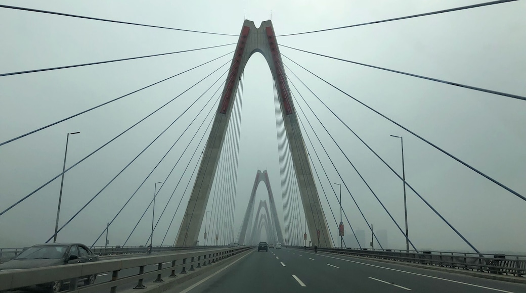 Into the spiders web. A misty welcome to Hanoi.