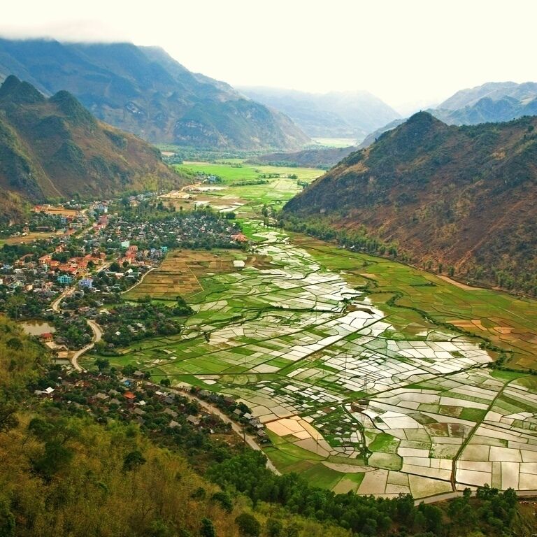 Spectacular view of Mai Chau to the left with rice paddies filling the river valley. We took an overnight excursion to a little Tai village outside Mai Chau where we wandered the village and paddies and stayed in a dormitory-style guesthouse (upgraded for tourists with a western-style bathroom). It was a charming evening and fun to see a bit of the countryside.