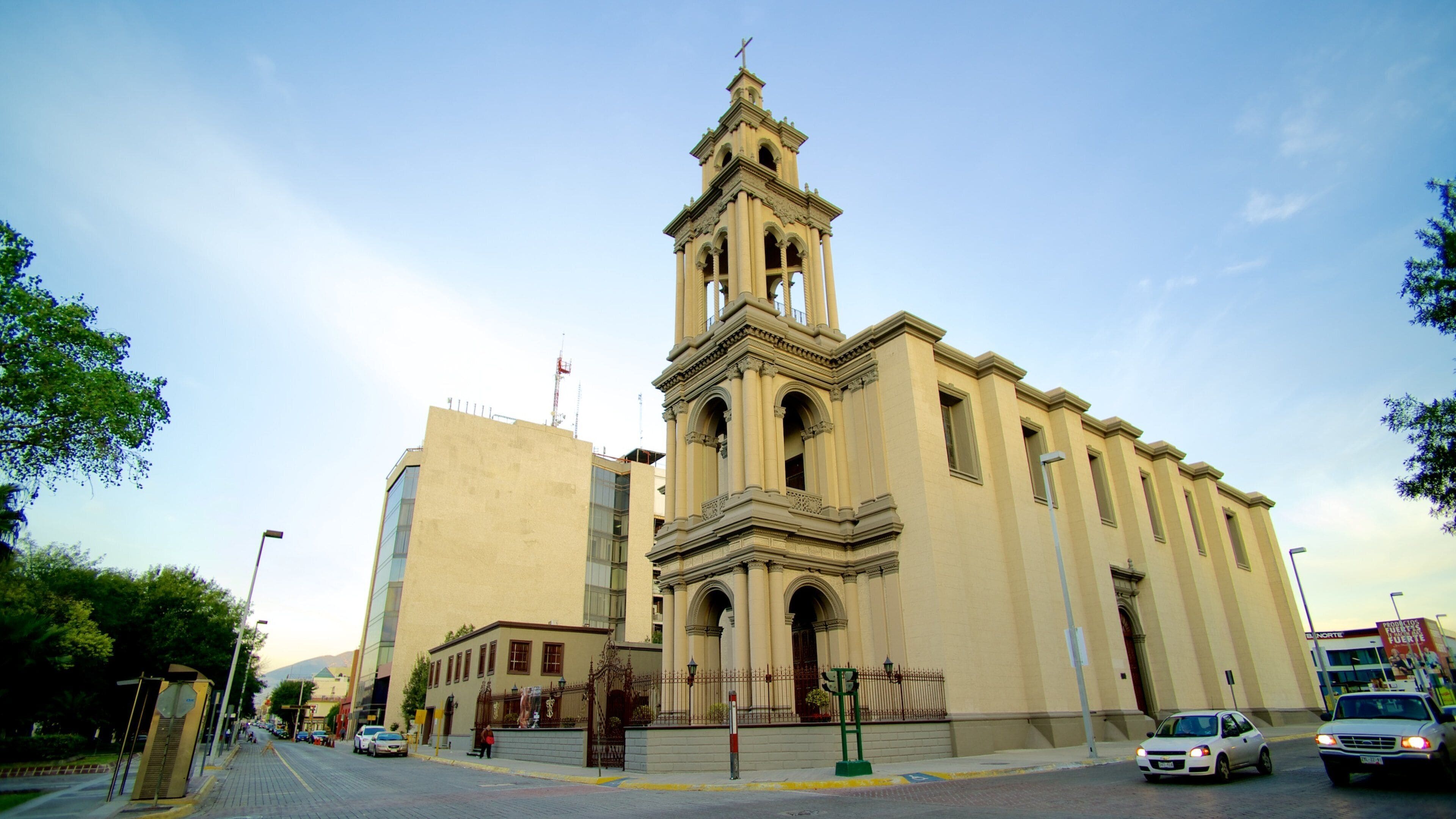 Iglesia Sagrado Corazon de Jesus featuring a city, a church or cathedral and street scenes