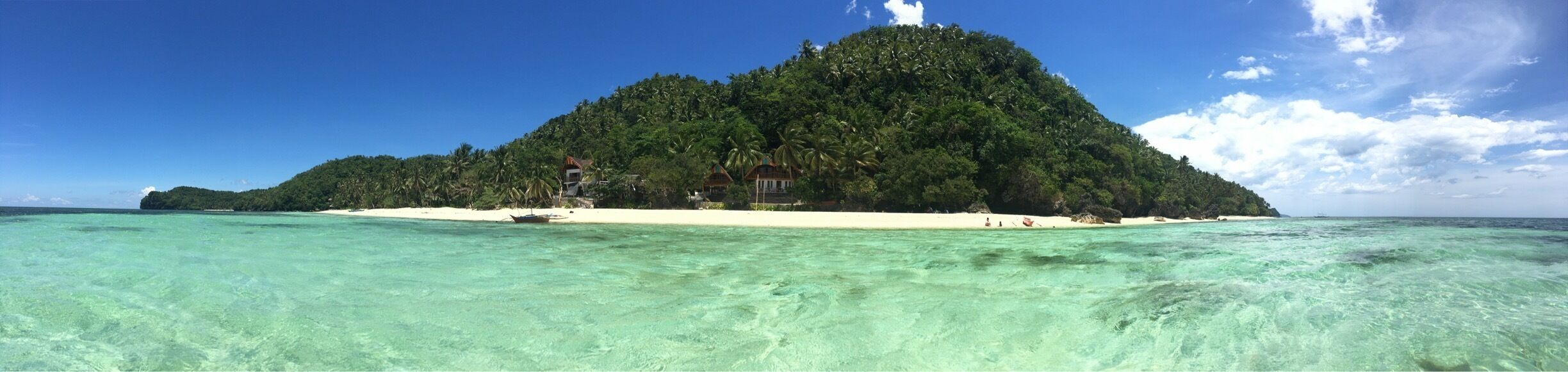 Hinugtan beach: A beautiful white sand beach hidden by a small mountain behind it. For details you can contact me.