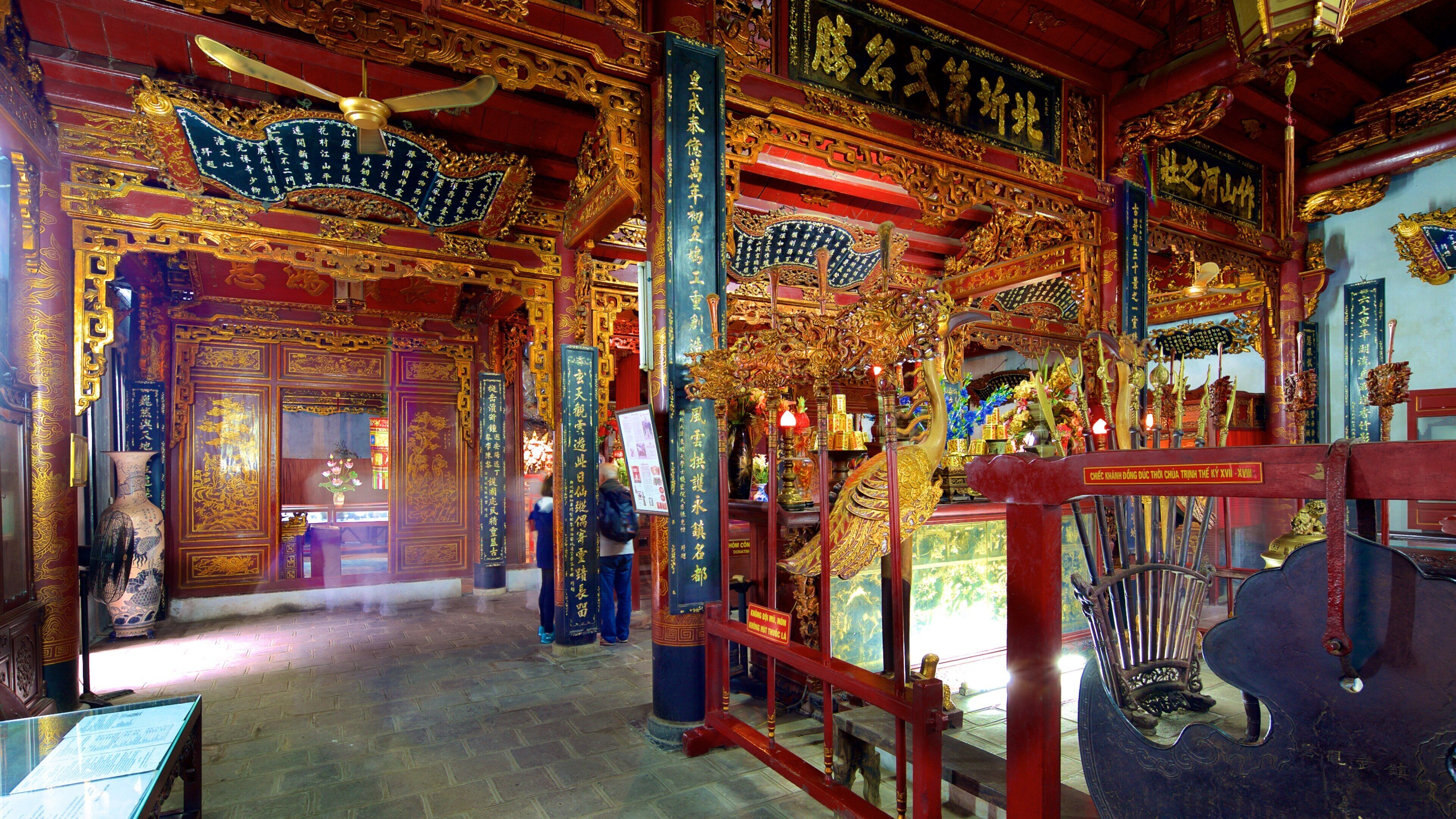 Quan Thanh Temple which includes a temple or place of worship, religious elements and interior views