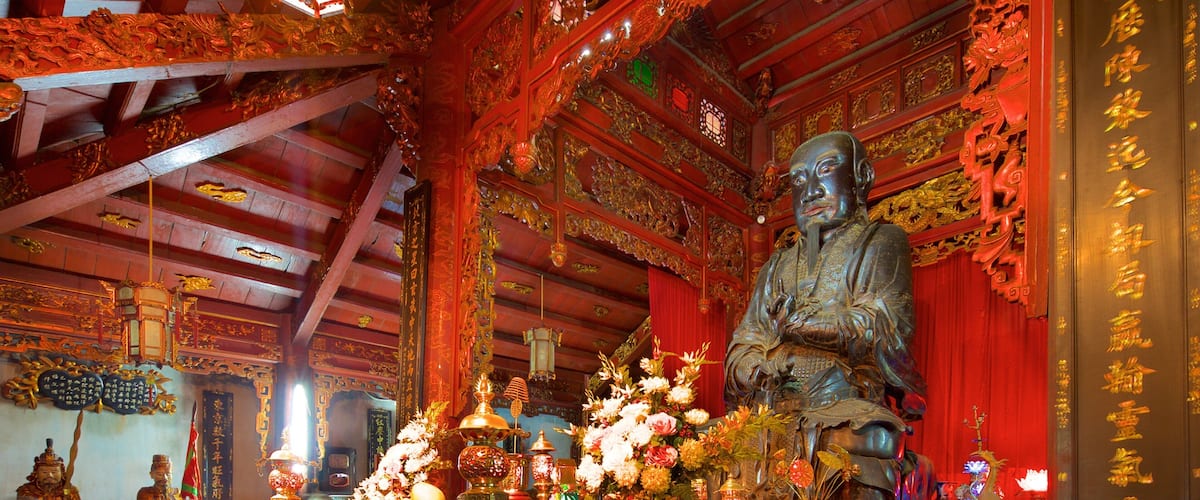 Quan Thanh Temple which includes a temple or place of worship, interior views and religious aspects