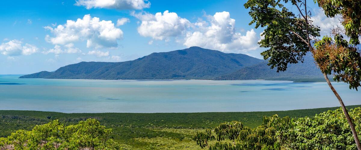 Panoramic view of the southern end of Trinity Bay in Cairns from the lookout point at the top of Mt. Whitfield, Red Arrow track, Cairns Botanic Gardens, Queensland, Australia