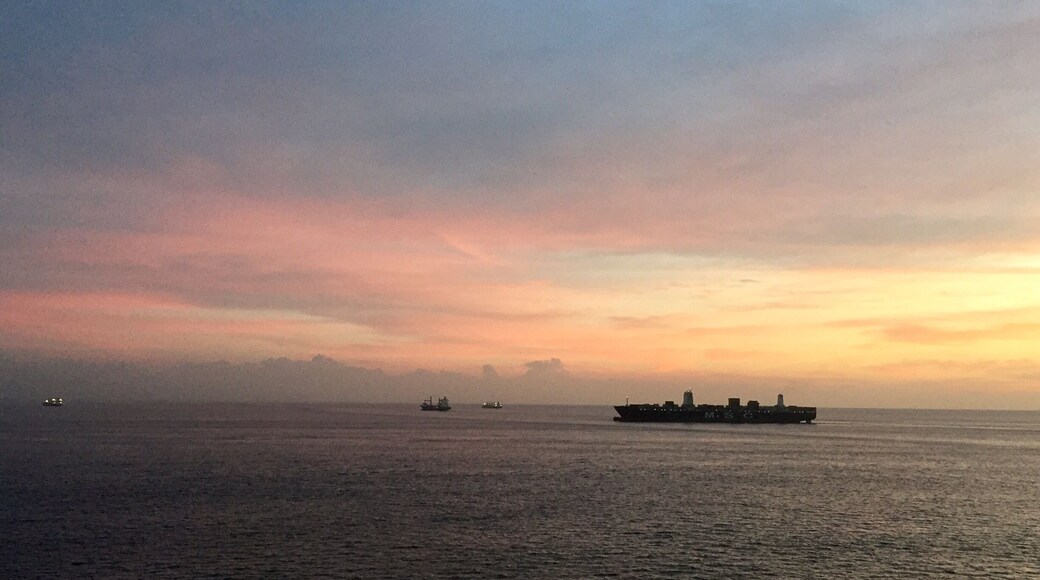 Sunrise outside Panama City, Panama prior to entering the Miraflores locks on the Pacific Ocean side of the Panama Canal.