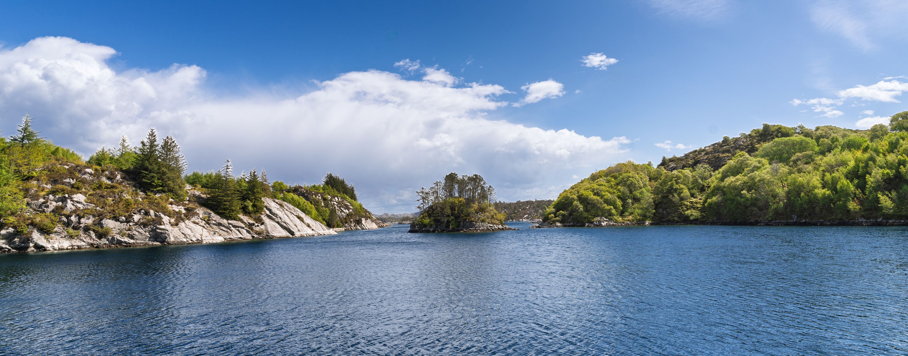 Crystal Clear Inlet Surrounded by Rocky Cliffs and Dotted with Greenery, Bomlo, Norway